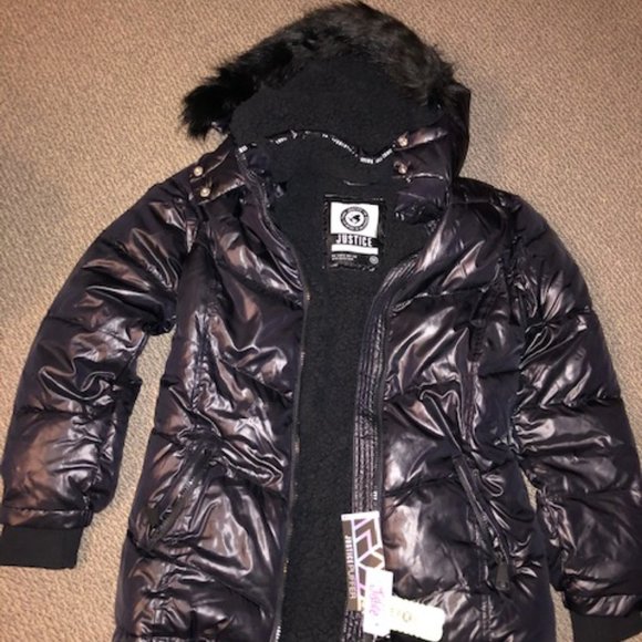 Size 14 Justice Puffer Jacket in black.Brand new!